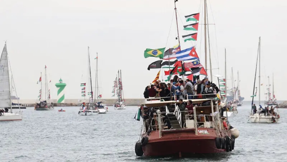Gaza flotilla organizers say surrounded by Israeli 'military boats'